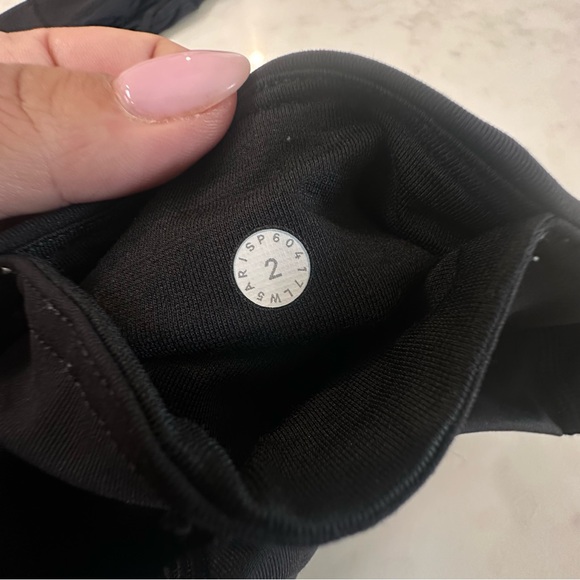 Lululemon Black “Tied to it” High Rise Leggings with mesh/tied ankle detail. - Picture 10 of 13